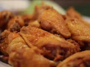 close up shot of basket of buffalo wings